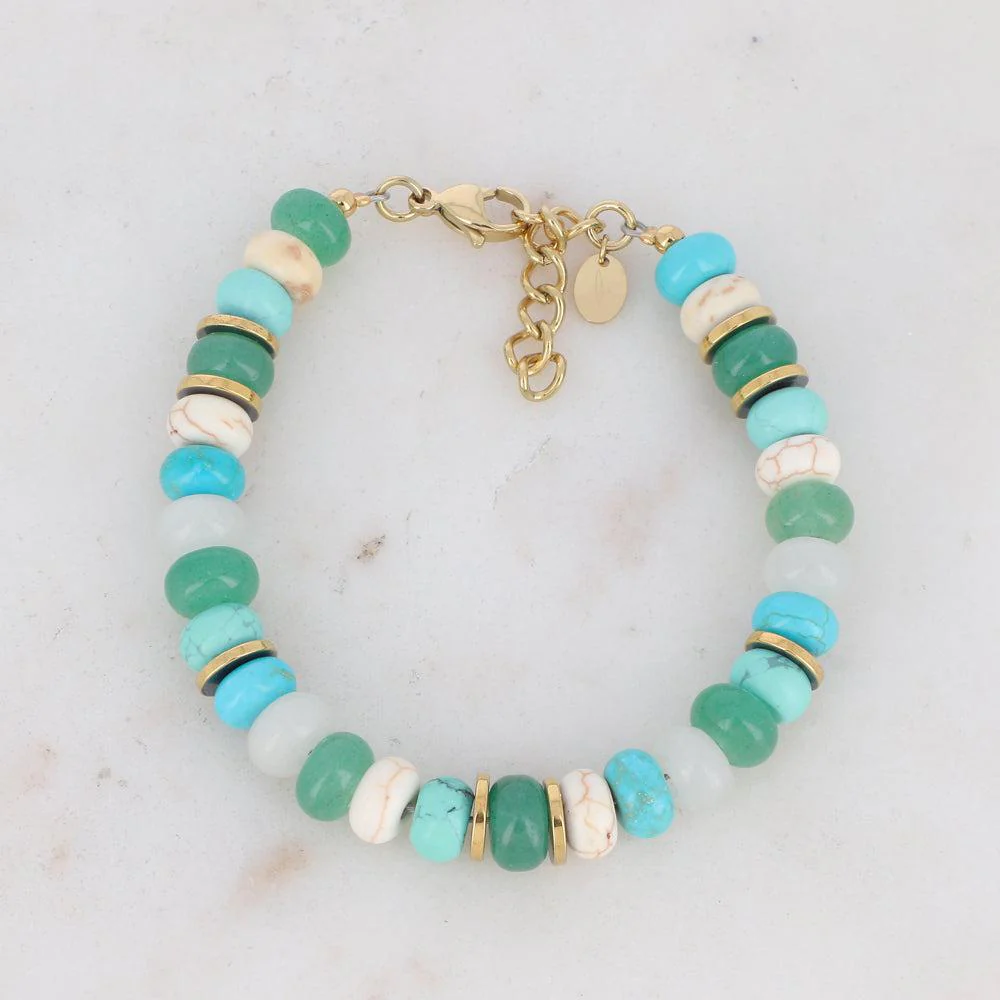 Bracelet doré avec pierres vertes et bleues